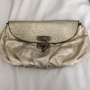 Cynthia Rowley gold clutch